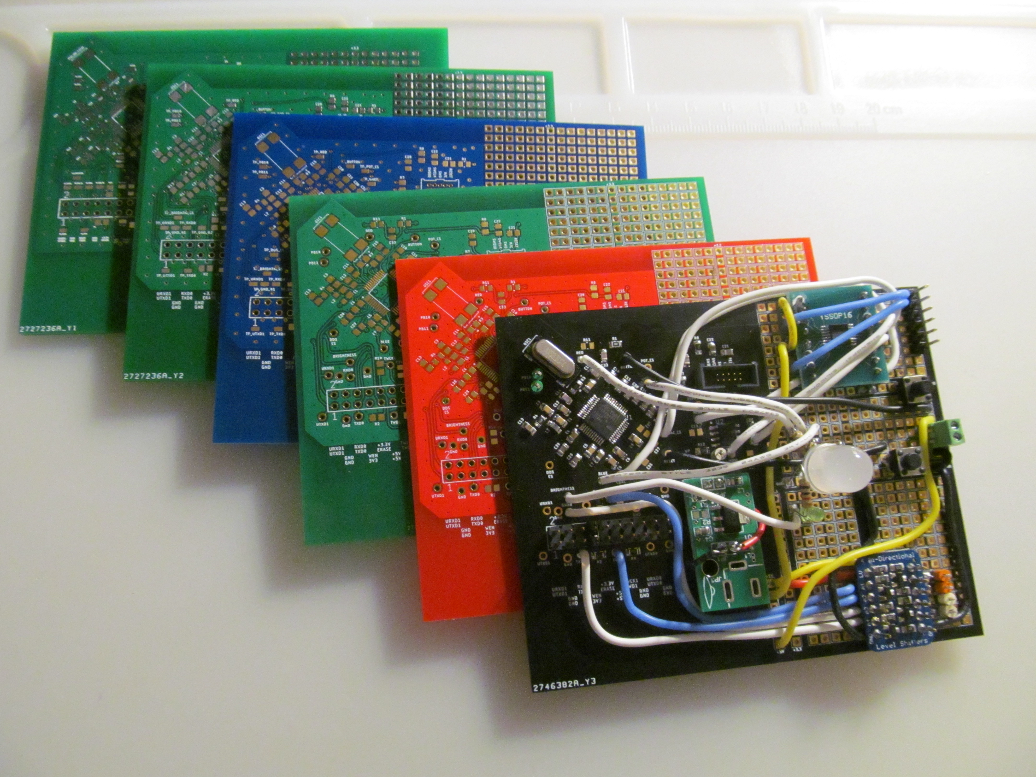green, blue, red, and black printed circuit boards